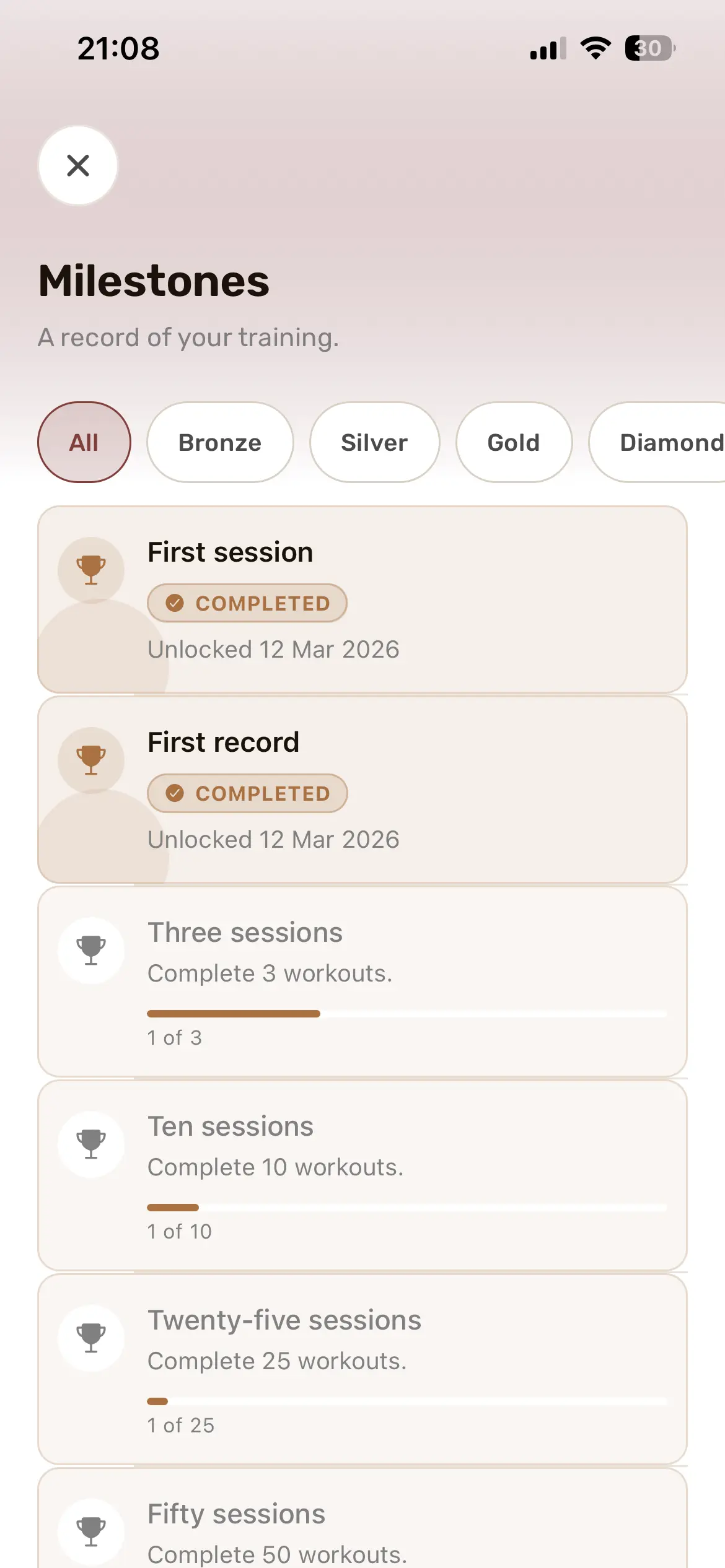 Pantalla de hitos de Overflow mostrando hitos completados y progreso hacia los siguientes.